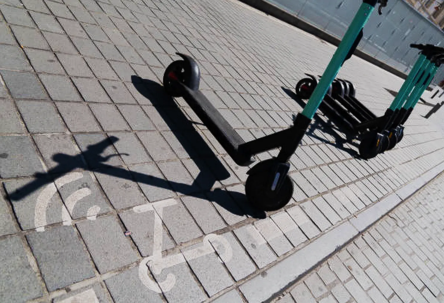 Imagine you park the scooter to a designated post, and it will recharge while standing.